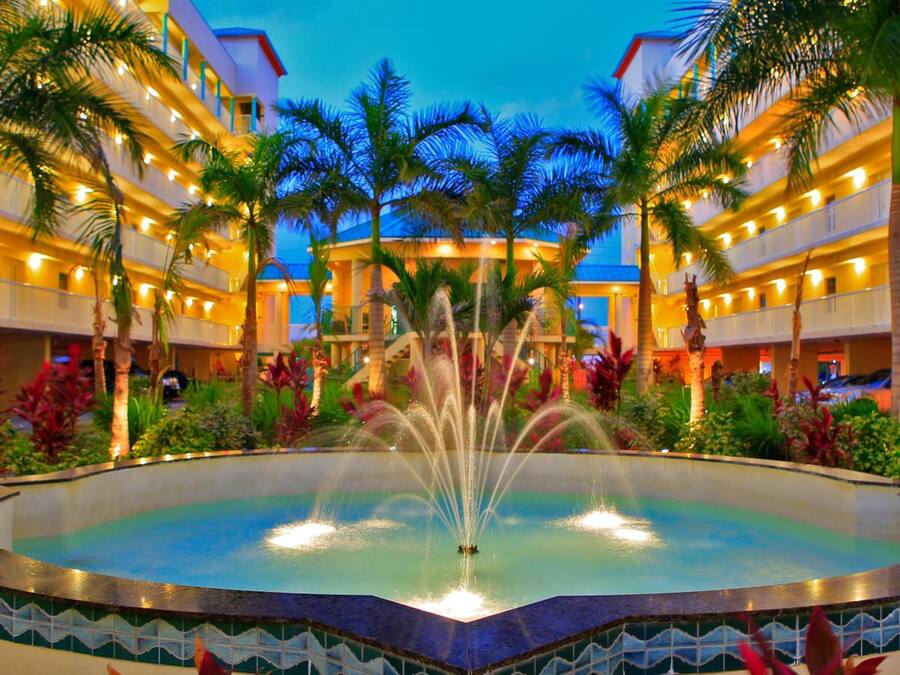 2 outdoor pools, open 9:00 AM to 10:00 PM, pool umbrellas, pool loungers