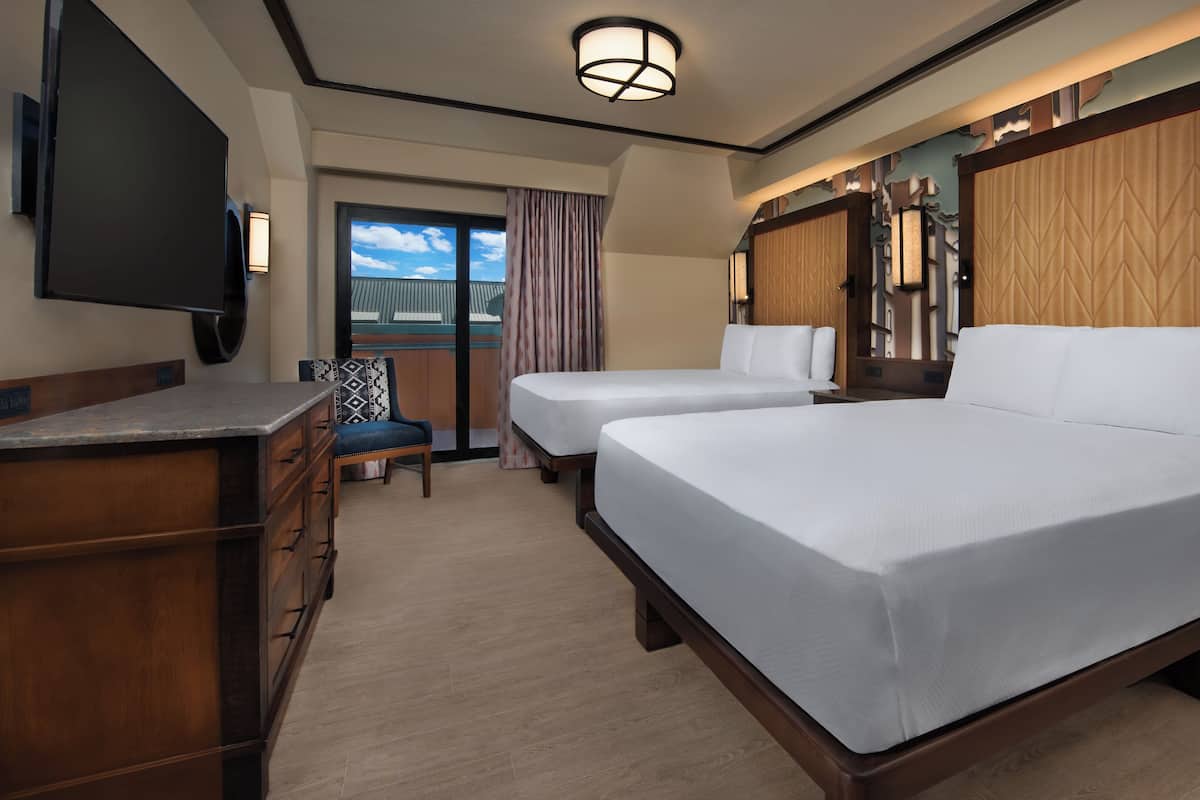 Resort View. Hearing accessible - visual alarms and notifications. 2 queen beds. | In-room safe, blackout curtains, iron/ironing board