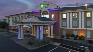 A Holiday Inn Express hotel with a brick facade, a covered entrance, and a parking lot. - Holiday Inn Express Hotel & Suites Chambersburg by IHG (Chambersburg)
