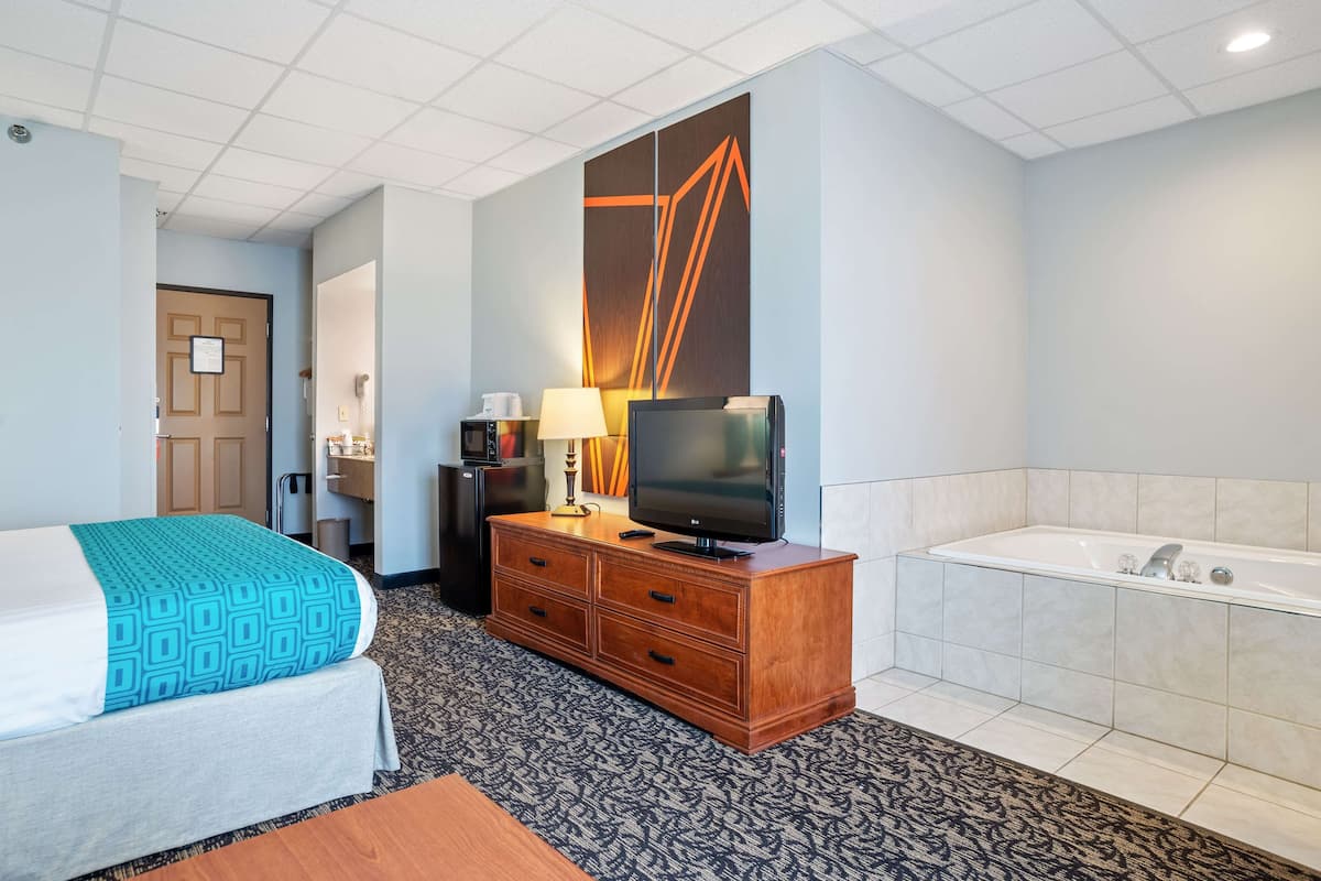 superior room, 1 king bed, accessible, non smoking (mobility accessible) | in-room safe, desk, iron/ironing board, rollaway beds