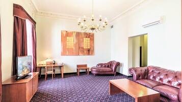 Suite, 1 Double Bed | Living area | Flat-screen TV