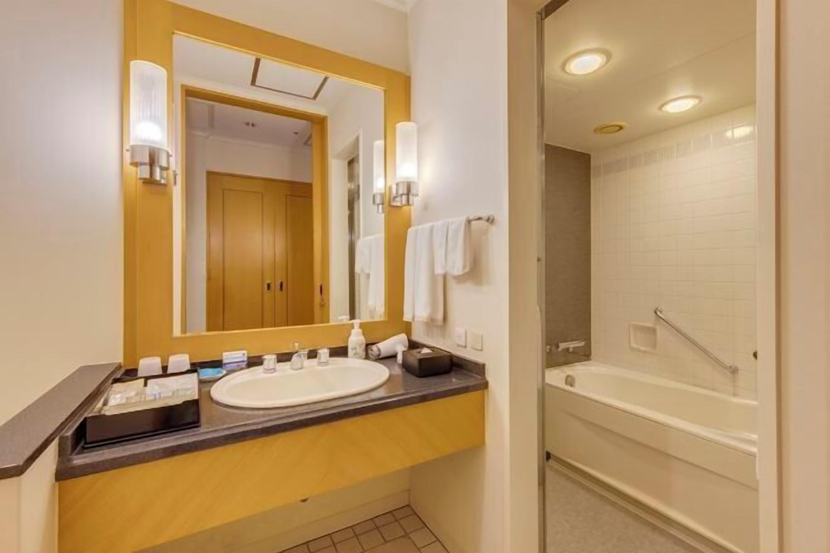 Free toiletries, hair dryer, slippers, electronic bidet