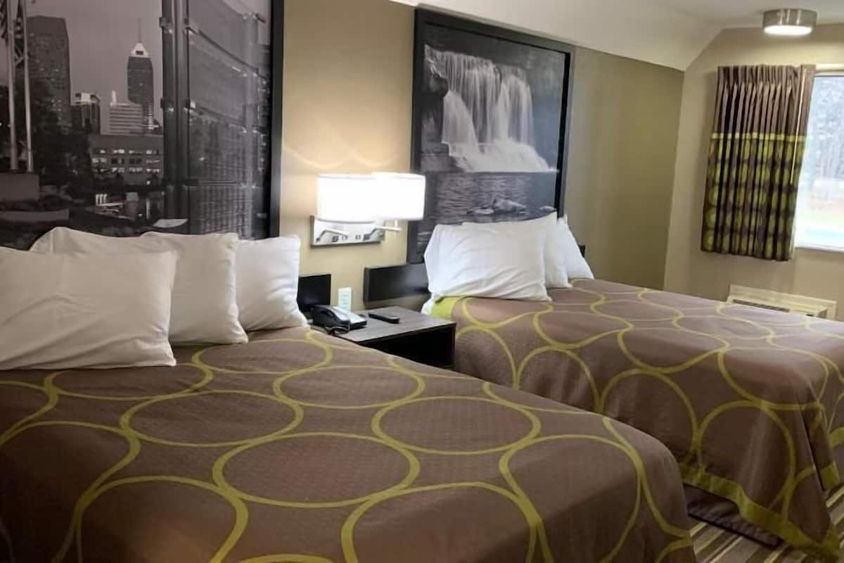 Desk, laptop workspace, blackout drapes, iron/ironing board