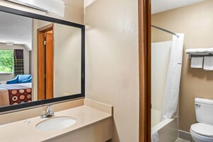 Room, 1 King Bed, Non Smoking | Bathroom | Combined shower/tub, free toiletries, hair dryer, towels