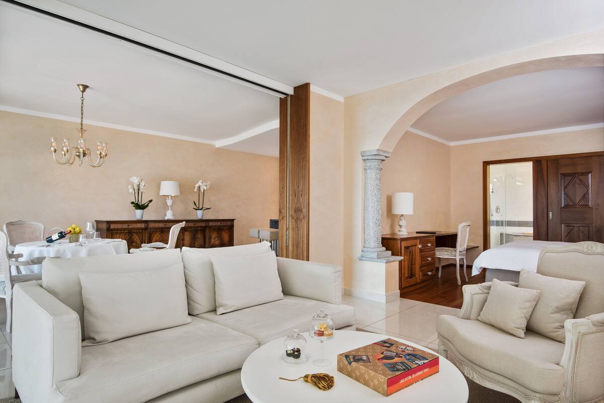 Panorama Corner Suite, Lake View | Premium bedding, down comforters, minibar, in-room safe