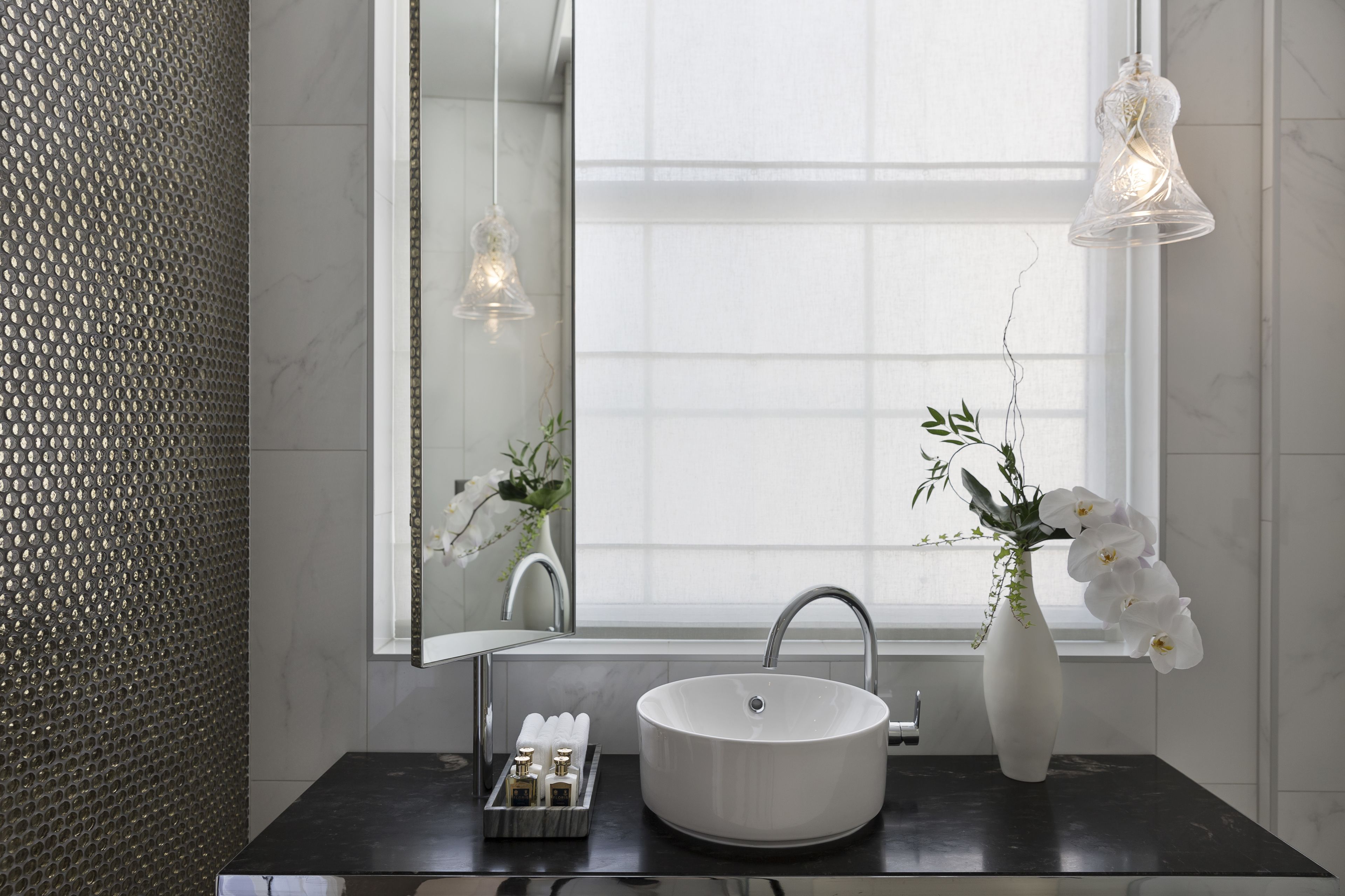 designer toiletries, hair dryer, bathrobes, slippers