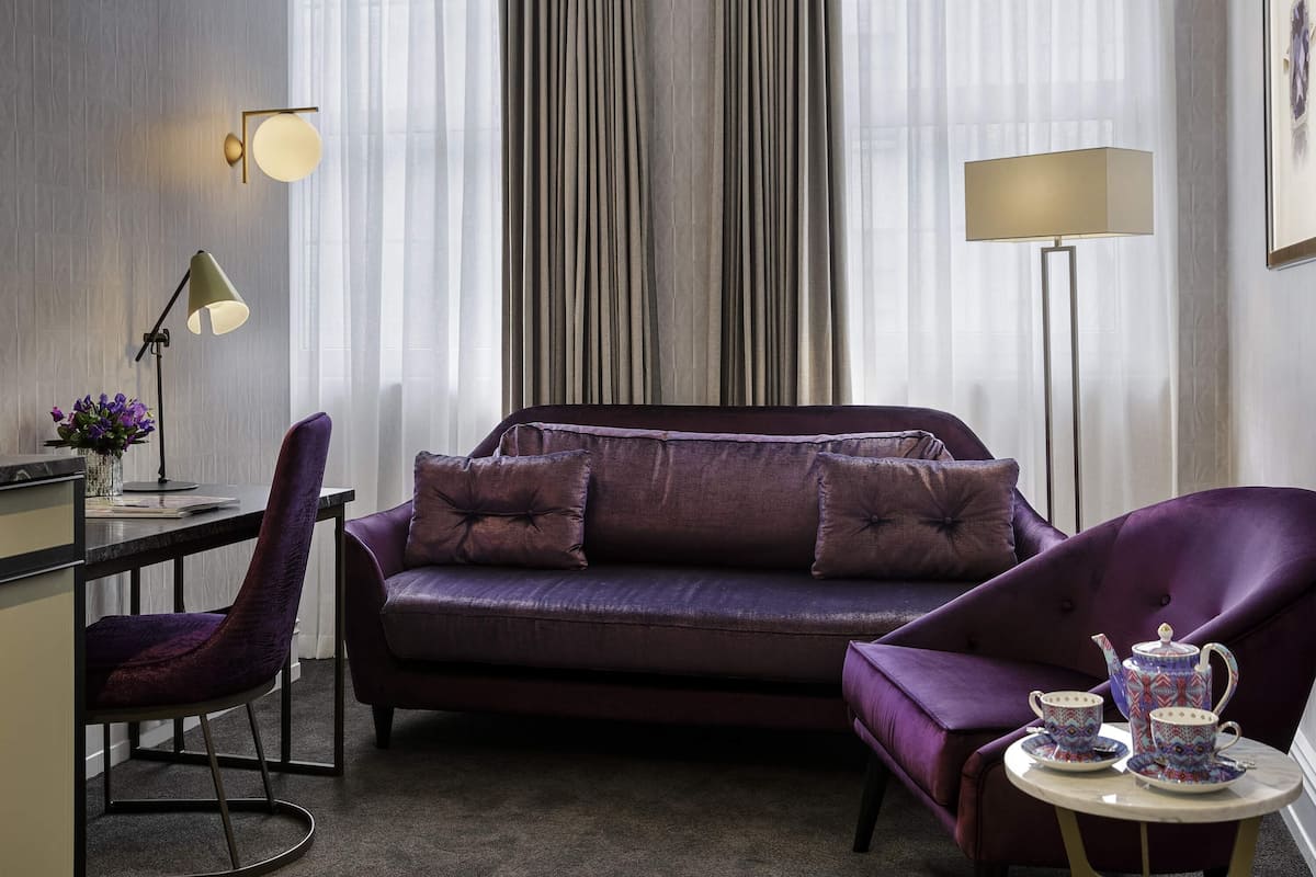 Junior Suite, 1 King Bed | Premium bedding, minibar, in-room safe, individually decorated