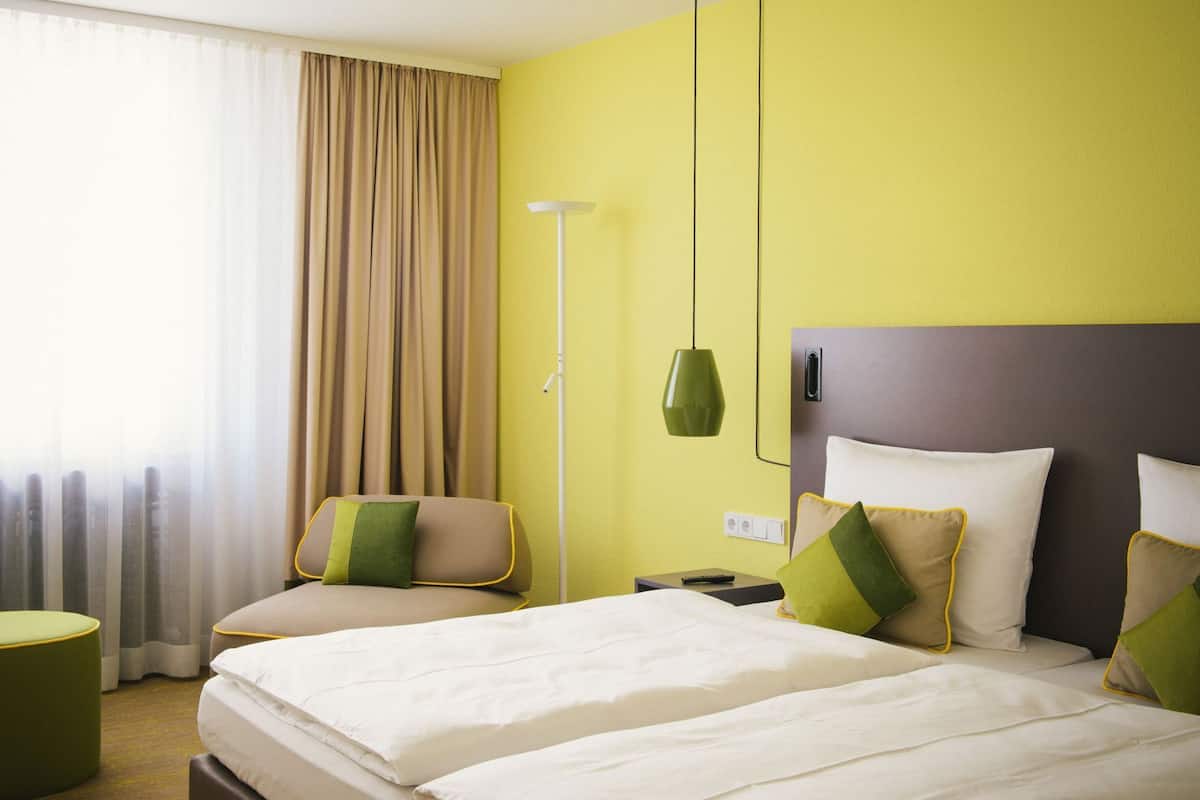 Premium bedding, desk, blackout drapes, soundproofing