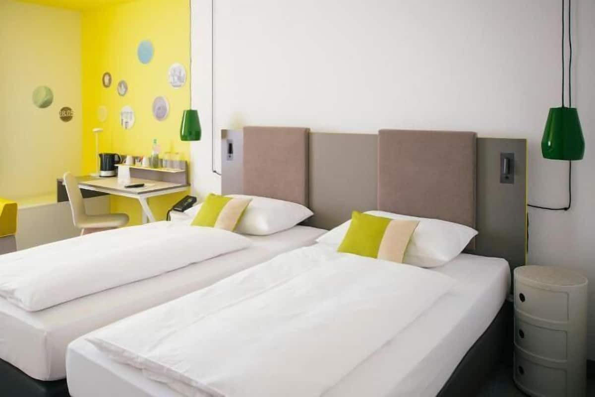 Premium bedding, desk, blackout drapes, soundproofing