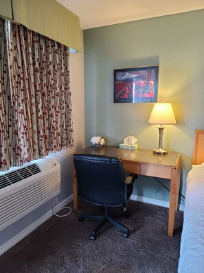 Premium bedding, Tempur-Pedic beds, desk, laptop workspace