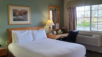 Premium bedding, Tempur-Pedic beds, desk, laptop workspace