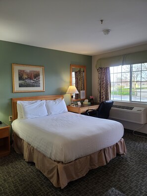 Premium bedding, Tempur-Pedic beds, desk, laptop workspace