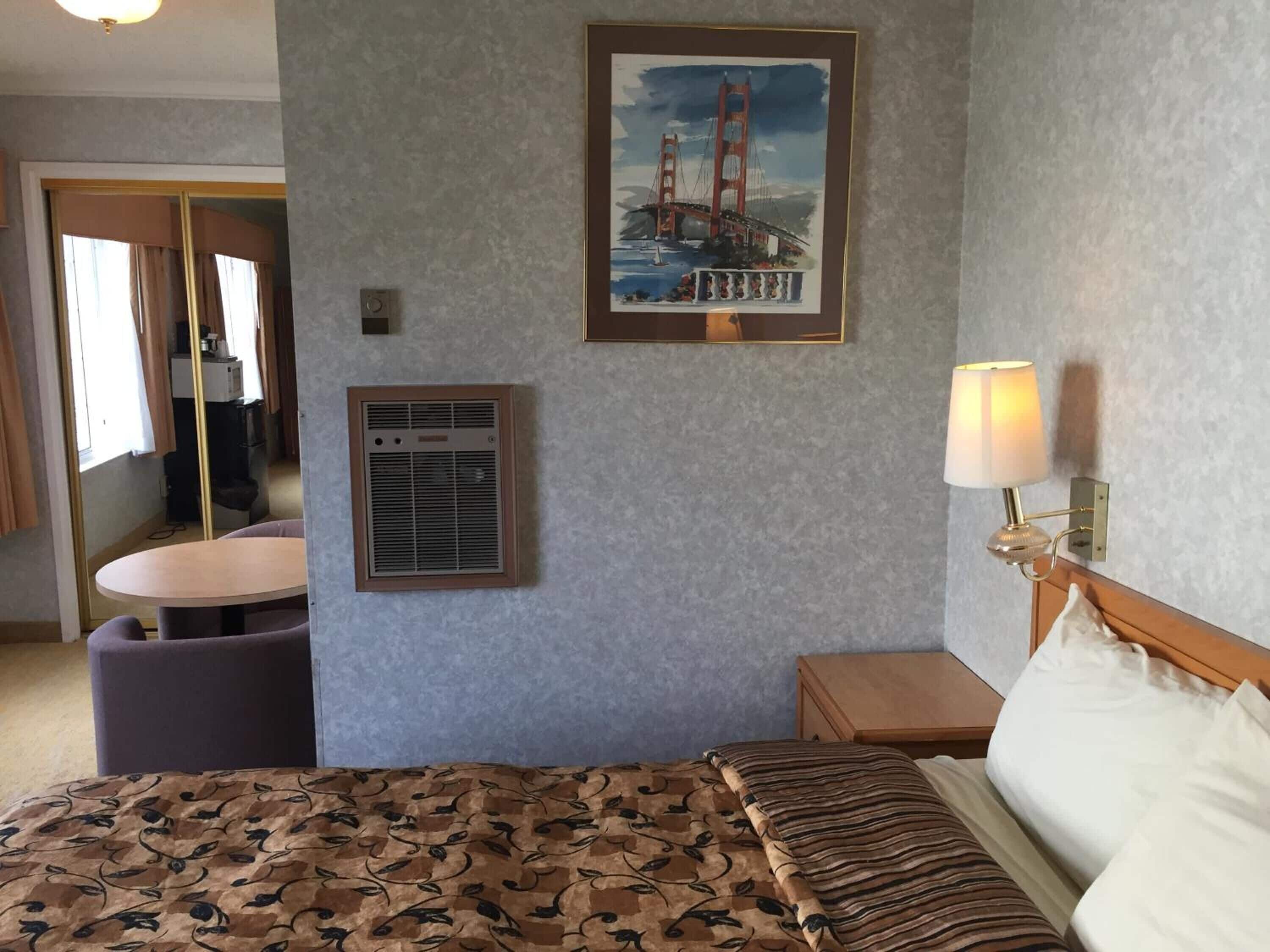 desk, blackout curtains, iron/ironing board, free wifi