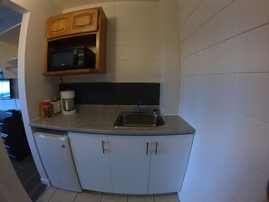 Fridge, microwave, coffee/tea maker, eco-friendly cleaning products