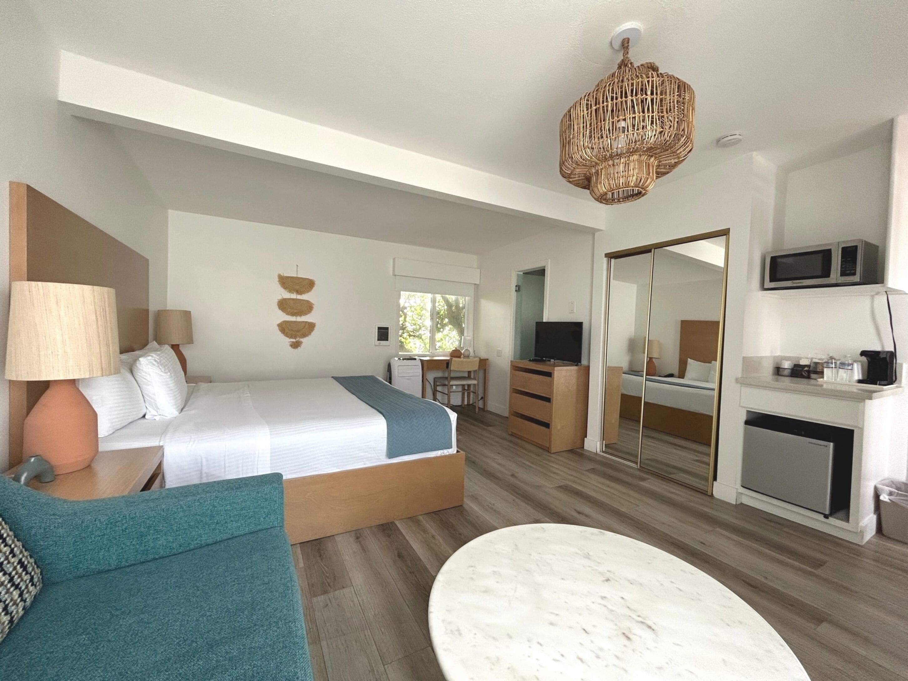 basic room, 1 king bed (deck view - one king) | in-room safe, iron/ironing board, free wifi, bed sheets