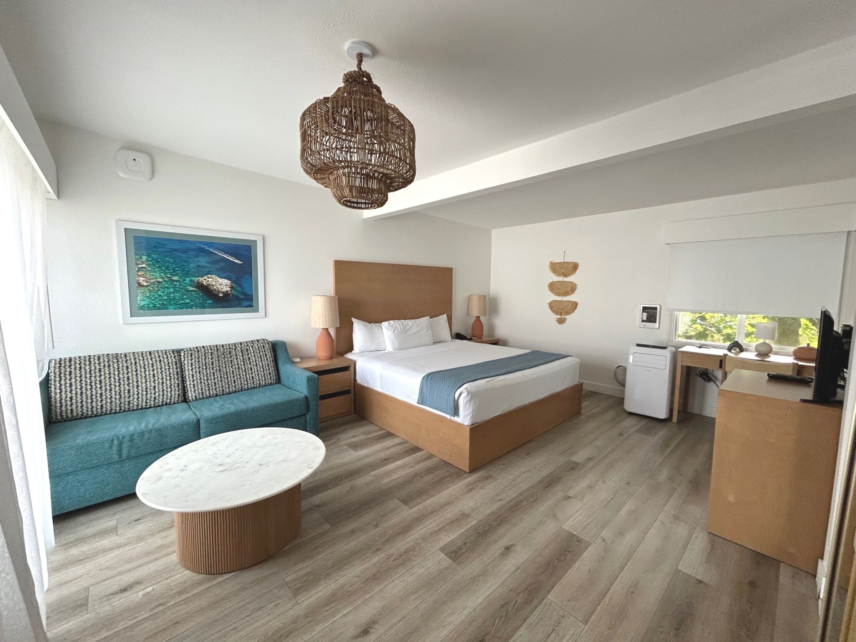 basic room, 1 king bed (deck view - one king) | in-room safe, iron/ironing board, free wifi, bed sheets