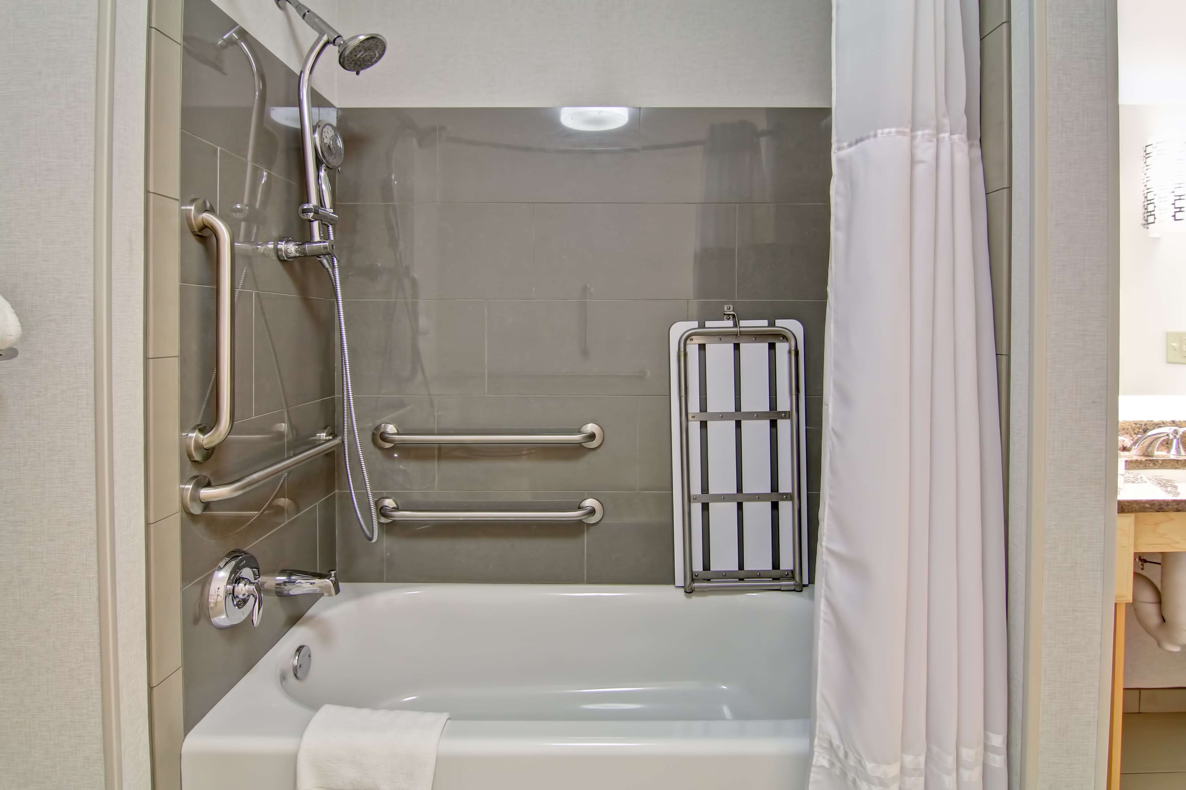 suite, 1 queen bed with sofa bed, accessible, bathtub | bathroom | free toiletries, hair dryer, towels