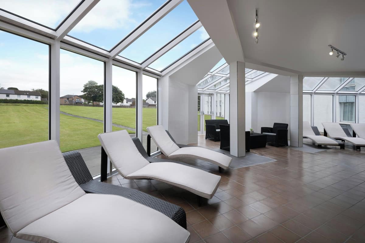 indoor pool, open 6:00 am to 9:00 pm, pool loungers