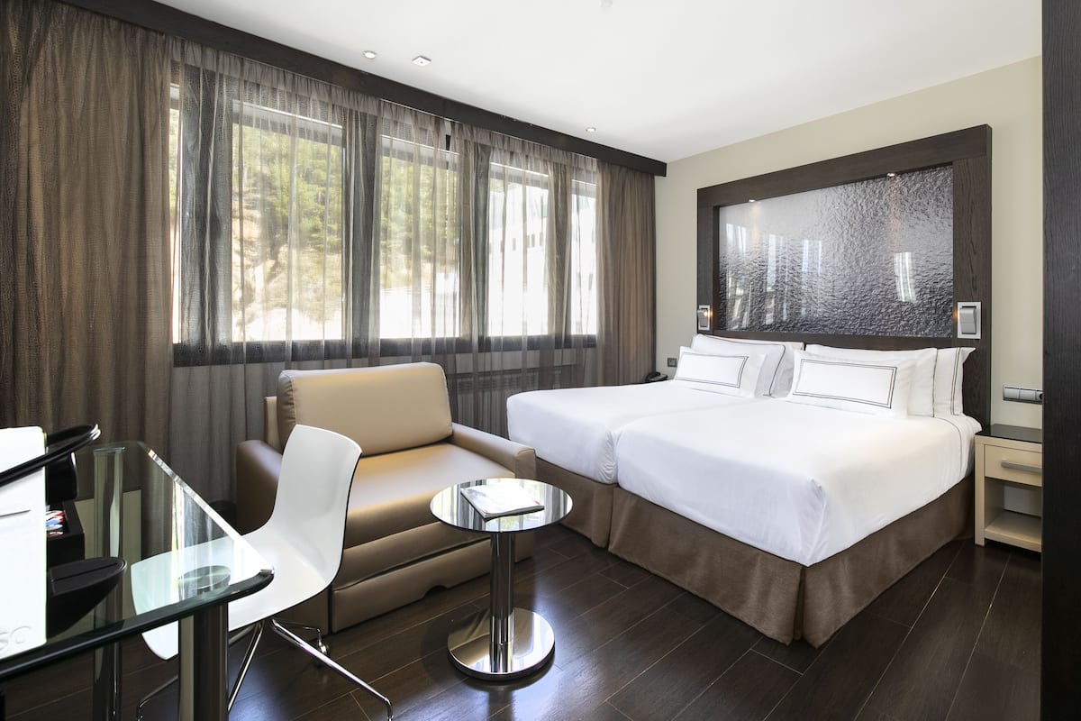 1 bedroom, down comforters, memory foam beds, minibar