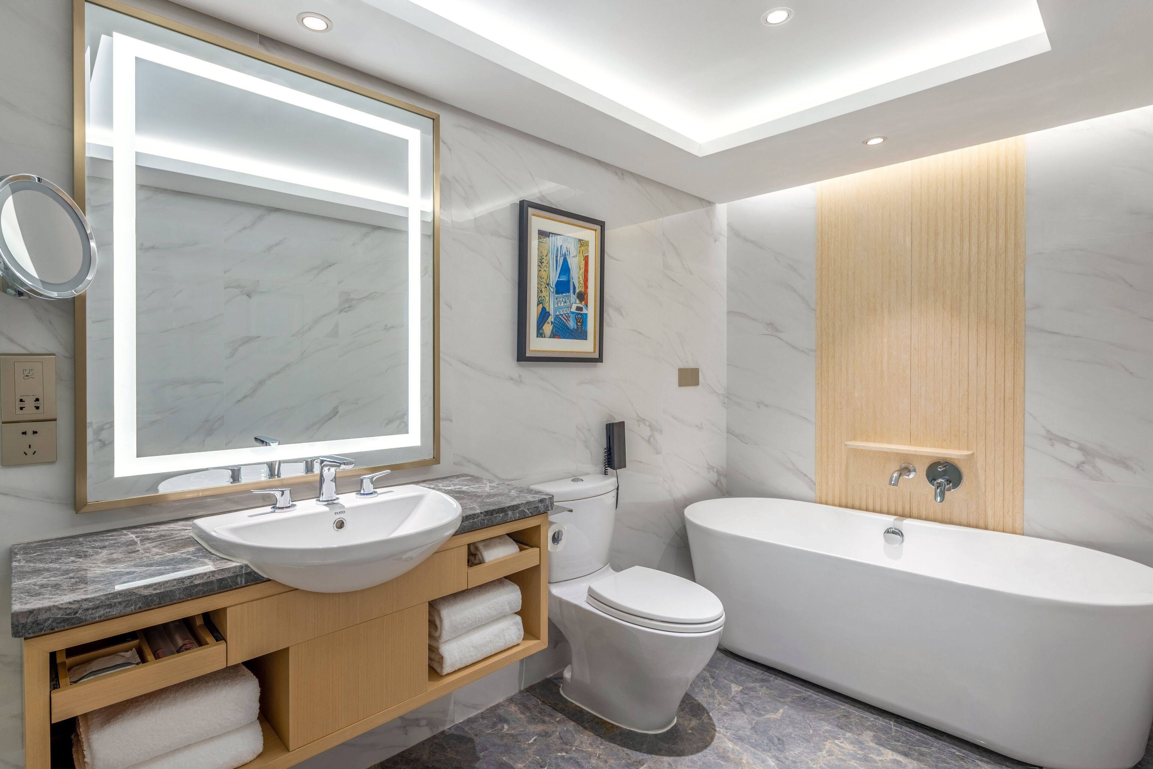 deep-soaking bathtub, rainfall showerhead, free toiletries, hair dryer