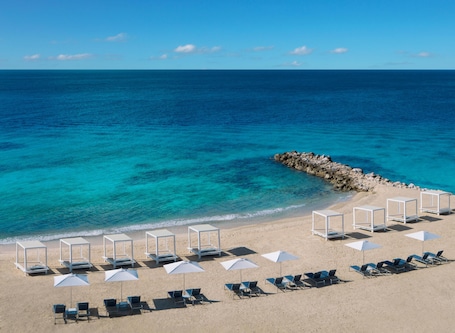 Private beach nearby, white sand, beach towels, beach massages