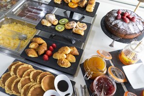 Daily buffet breakfast (EUR 14 per person)