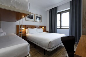 Quadruple Room | Minibar, in-room safe, desk, blackout drapes