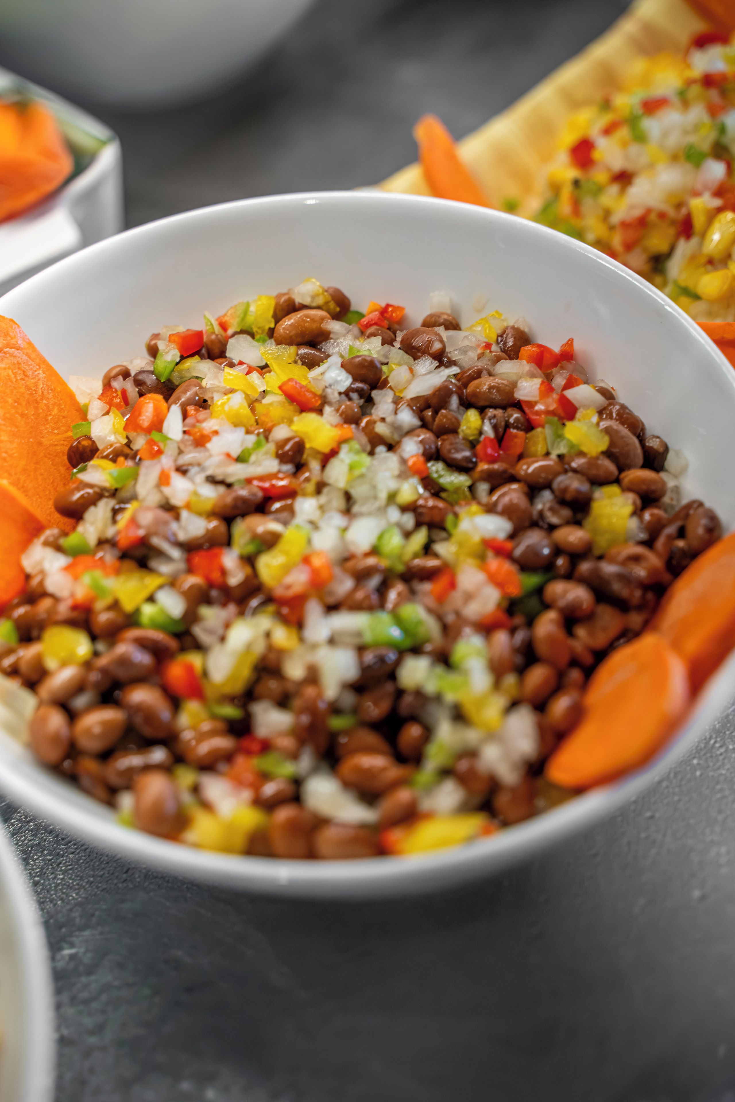 A bowl of mixed beans and vegetables.