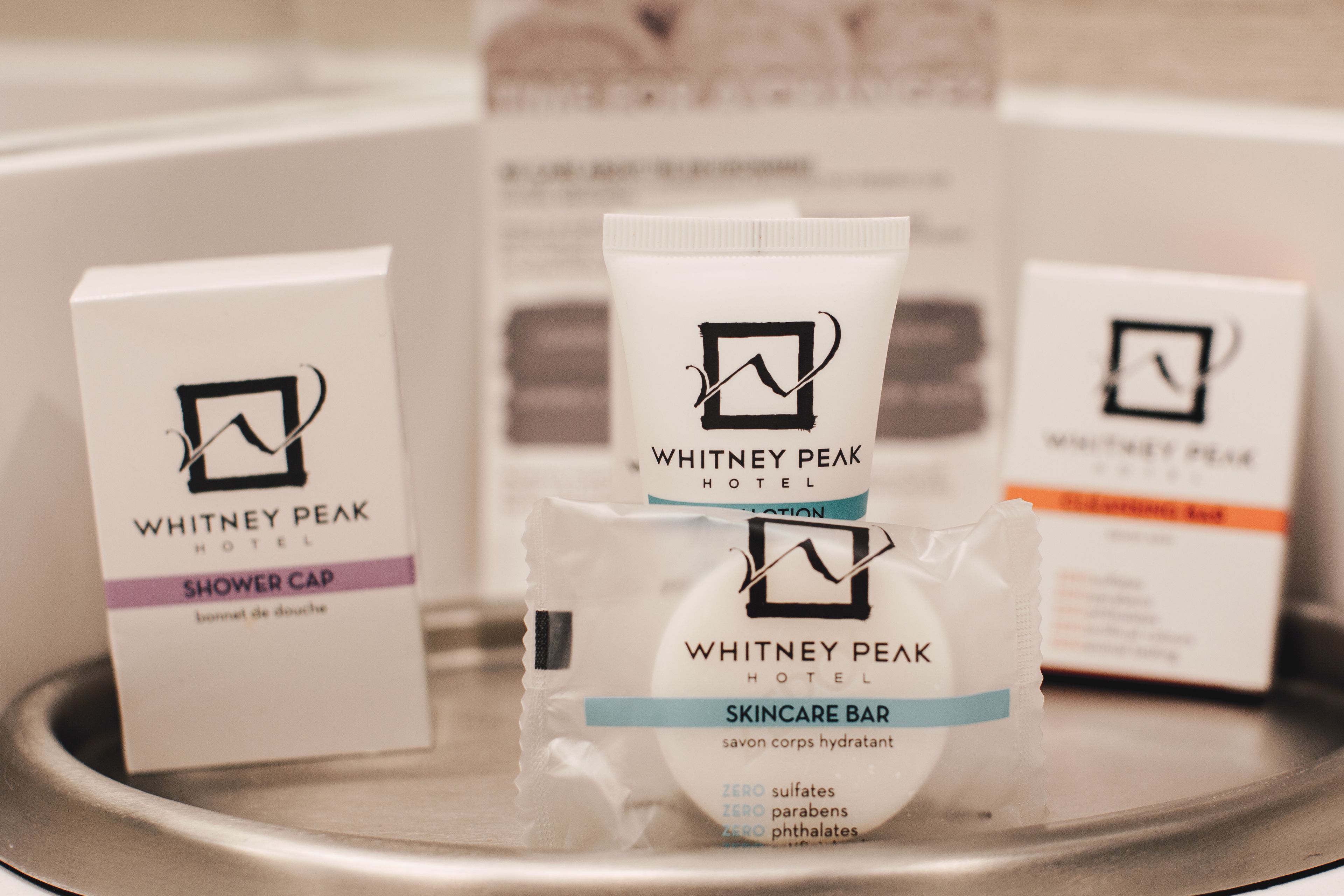 combined shower/bathtub, designer toiletries, hair dryer, bathrobes