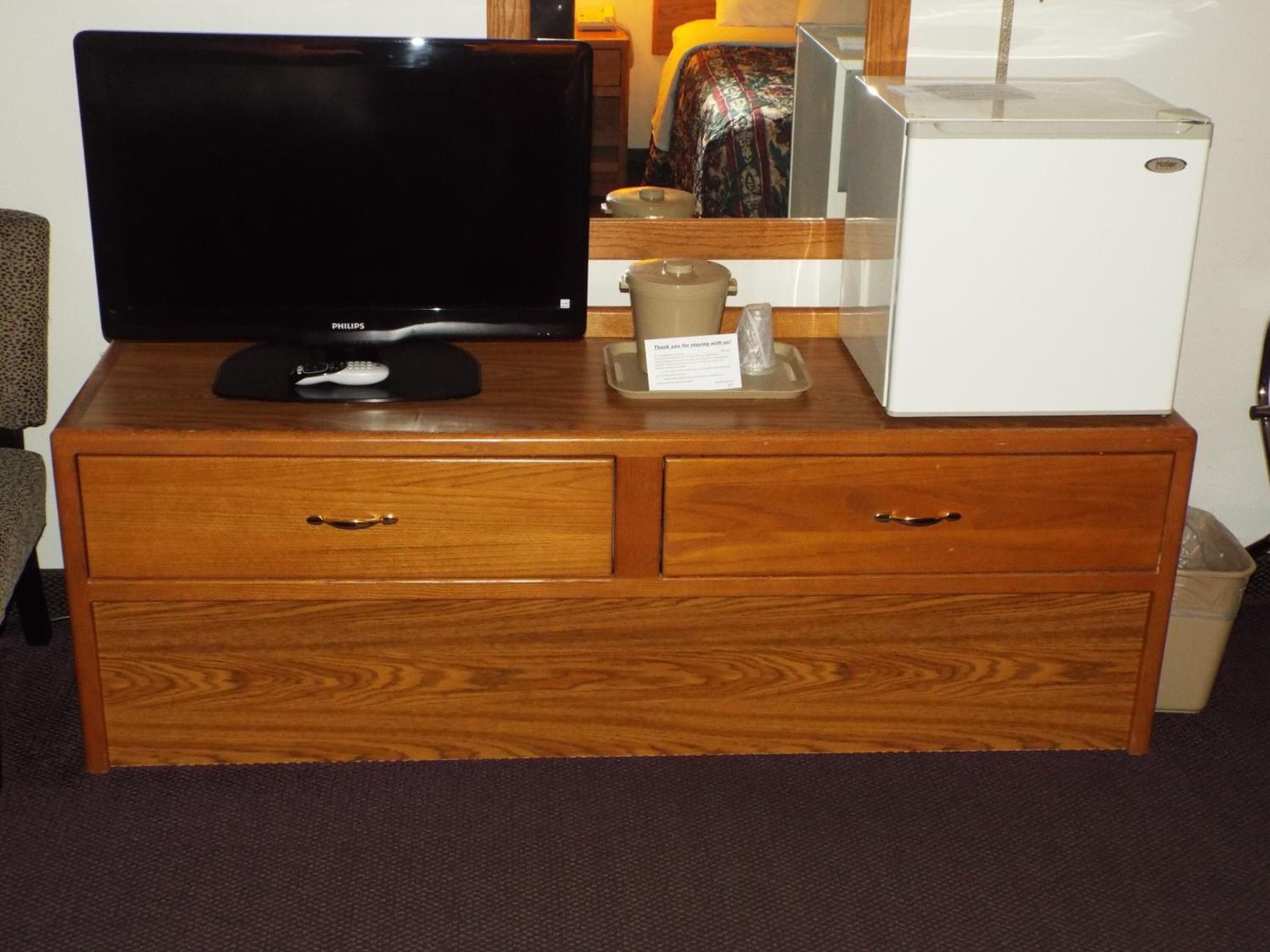 desk, laptop workspace, blackout curtains, iron/ironing board