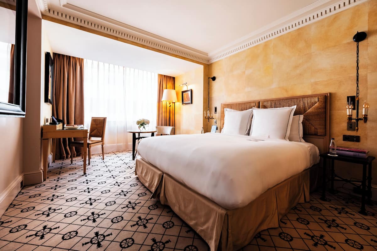 Habitación Deluxe, 1 cama King size | Ropa de cama de alta calidad y minibar