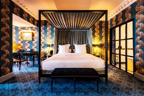 Suite, 1 King Bed with Sofa bed | Premium bedding, minibar, in-room safe, individually decorated