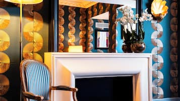Suite, 1 King Bed with Sofa bed | Premium bedding, minibar, in-room safe, individually decorated
