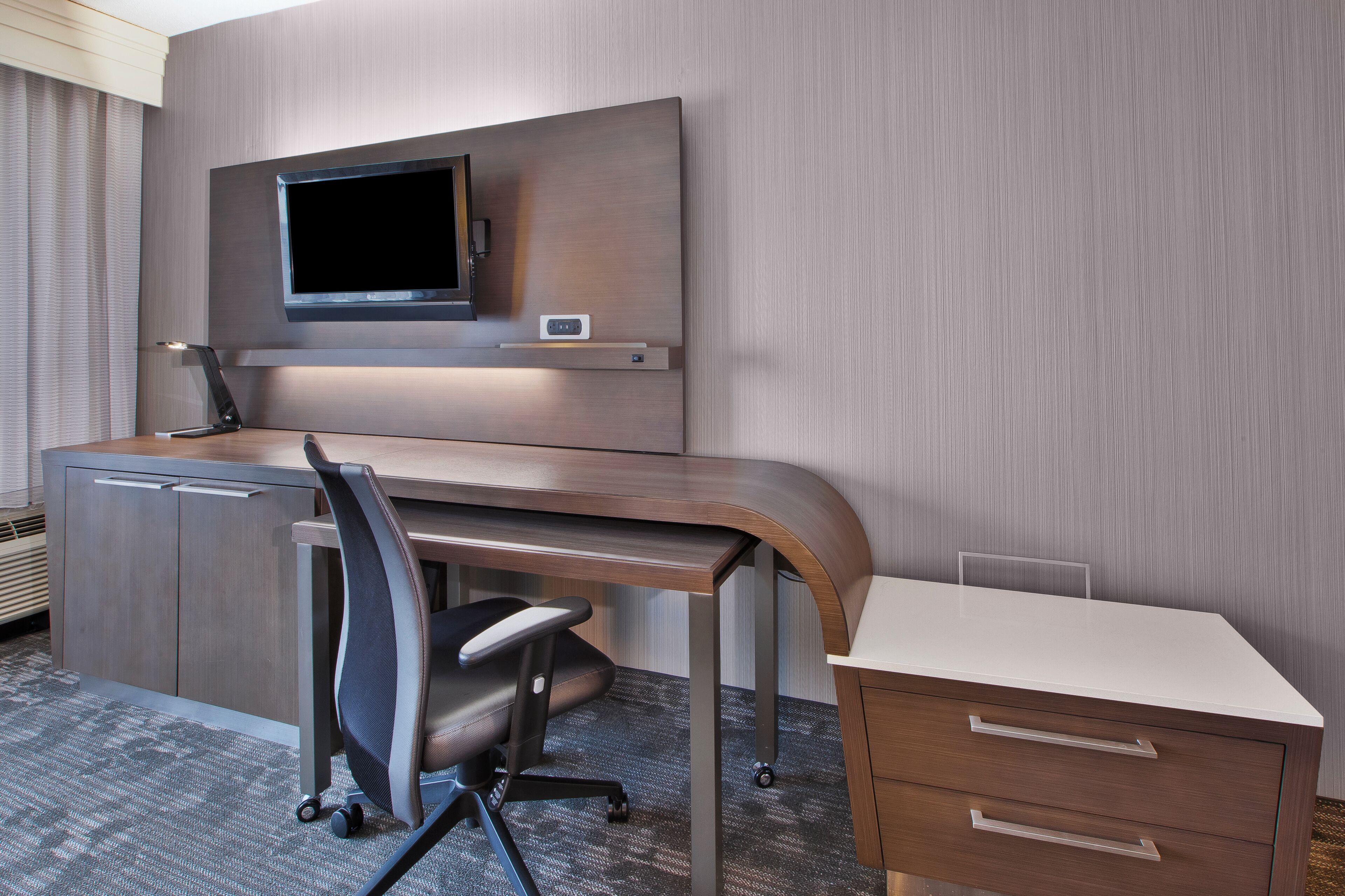 desk, laptop workspace, blackout curtains, iron/ironing board