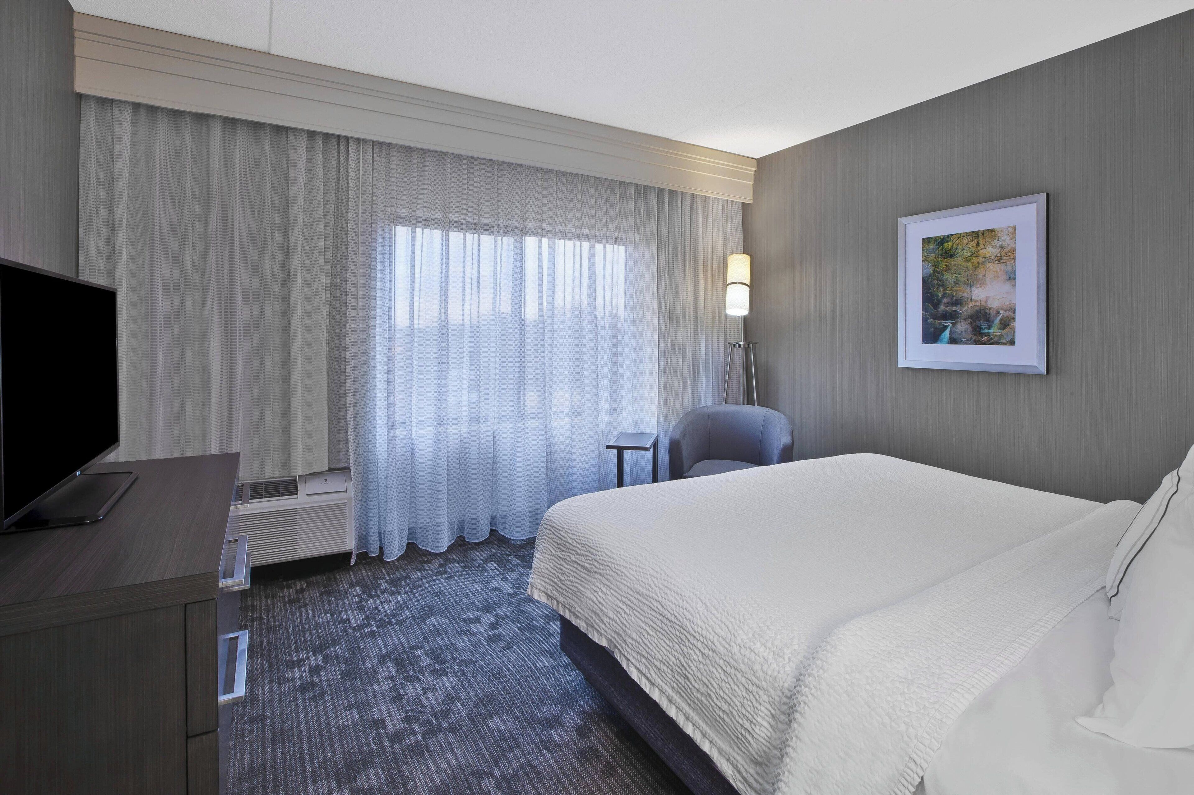 room, 1 king bed with sofa bed | desk, laptop workspace, blackout curtains, iron/ironing board