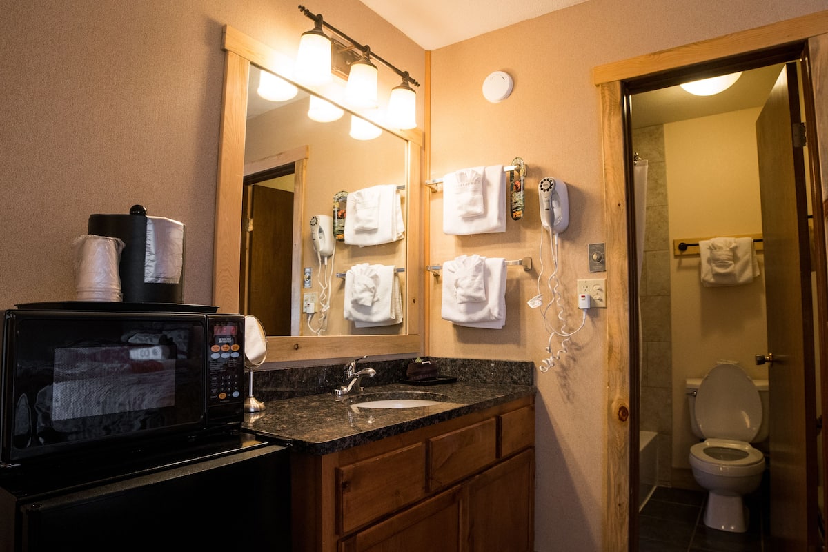 deluxe room, multiple beds (not pet friendly) | bathroom sink