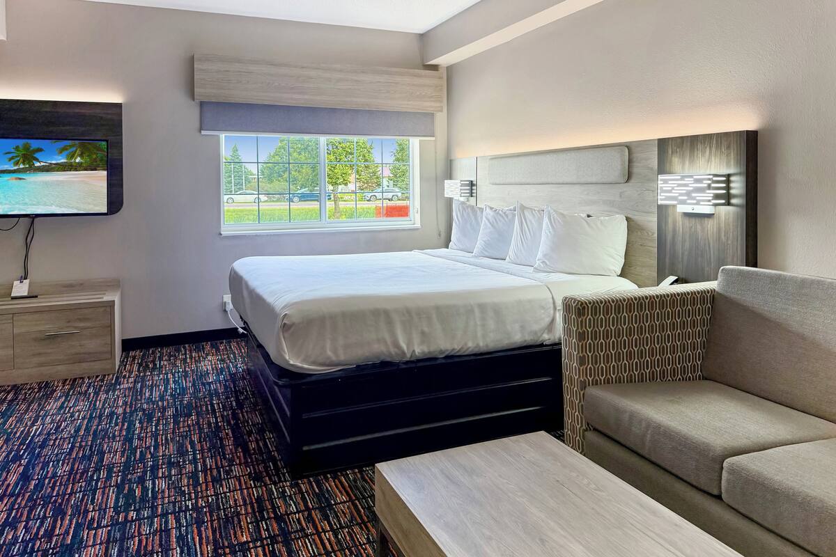 Premium bedding, desk, blackout drapes, iron/ironing board