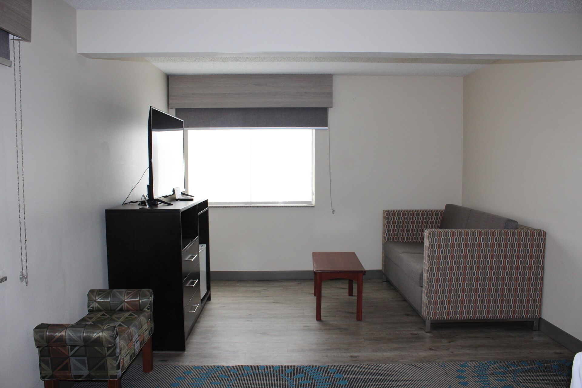 suite, 1 king bed, non smoking (east building) | 1 bedroom, premium bedding, desk, blackout curtains