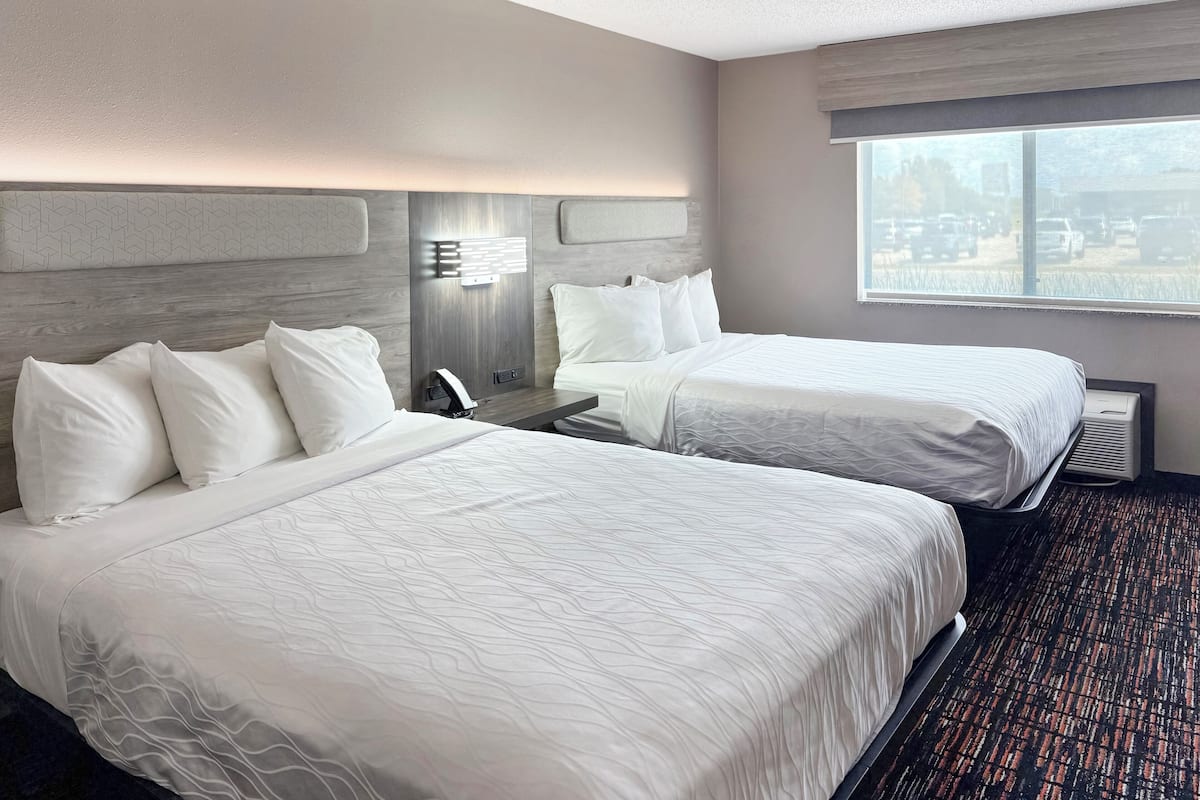 Premium bedding, desk, blackout drapes, iron/ironing board