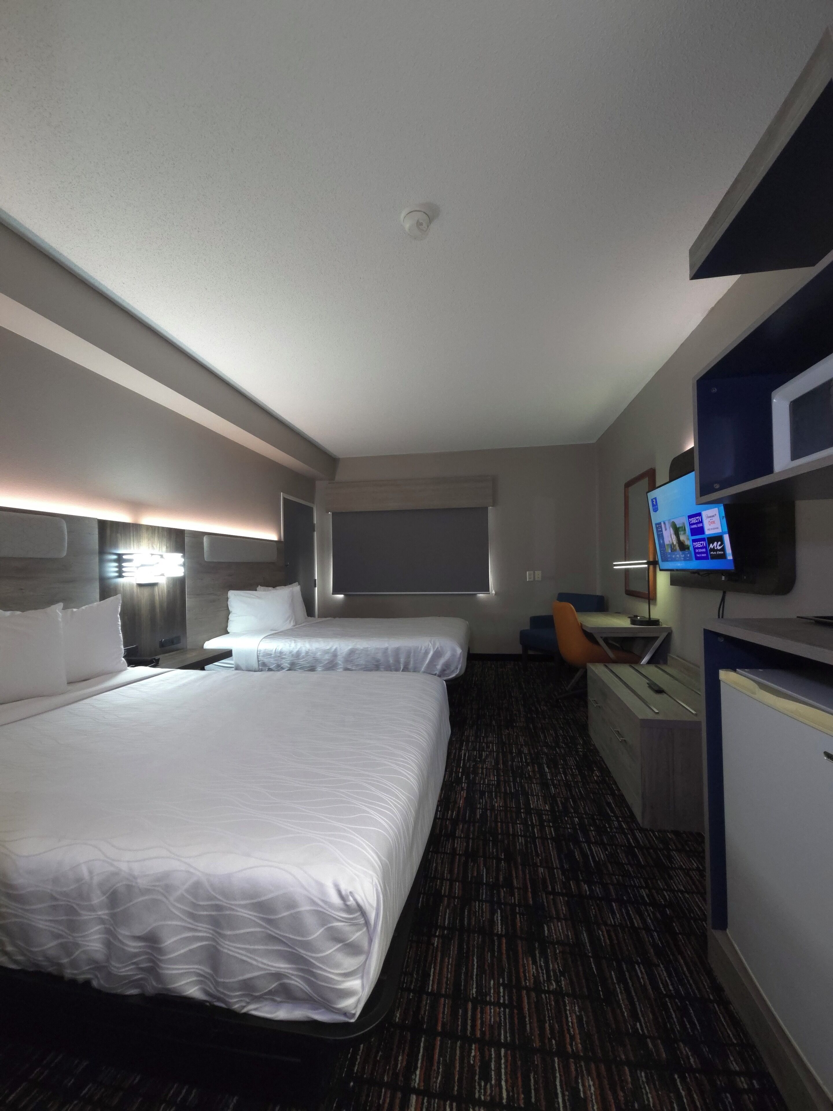 Premium bedding, desk, blackout curtains, iron/ironing board