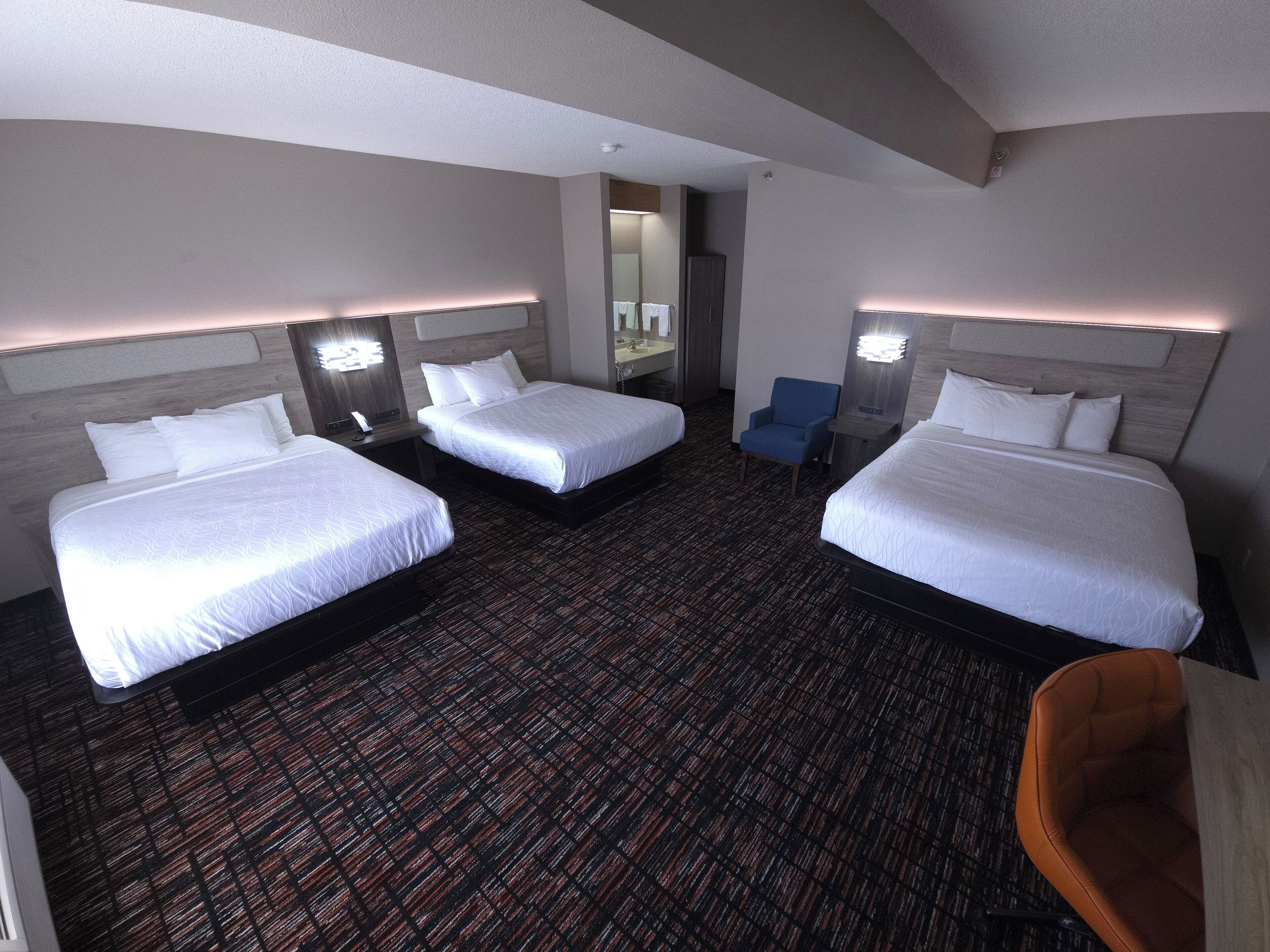 Premium bedding, desk, blackout curtains, iron/ironing board