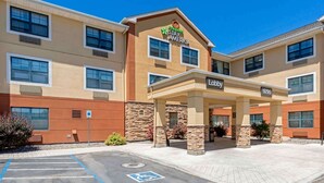 A hotel with a 'Marriott Stay America' sign, a lobby entrance, and a parking area with a handicapped parking space. - Extended Stay America Suites Reno South Meadows (Reno)