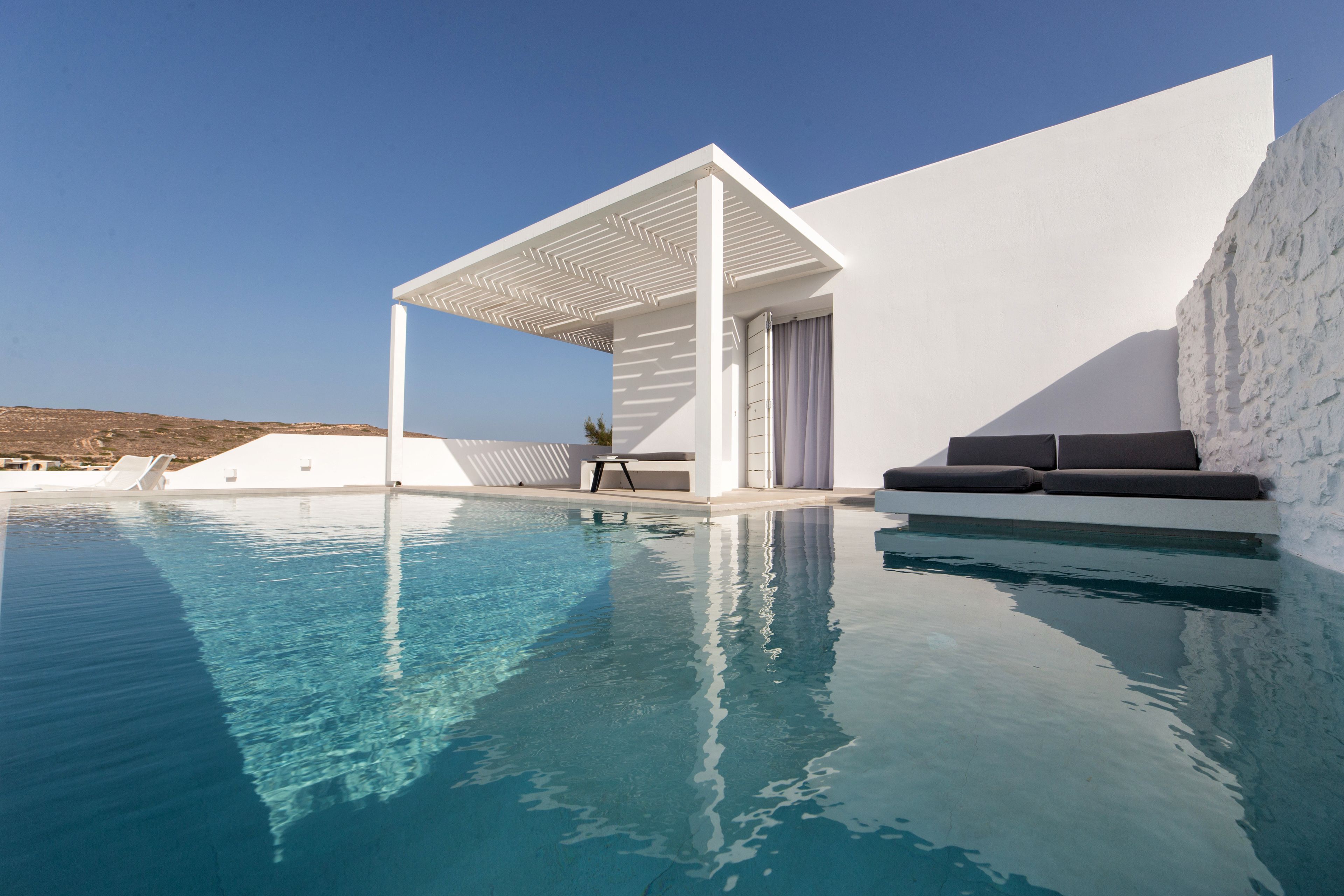 executive suite, private pool, sea view | 1 bedroom, premium bedding, minibar, in-room safe