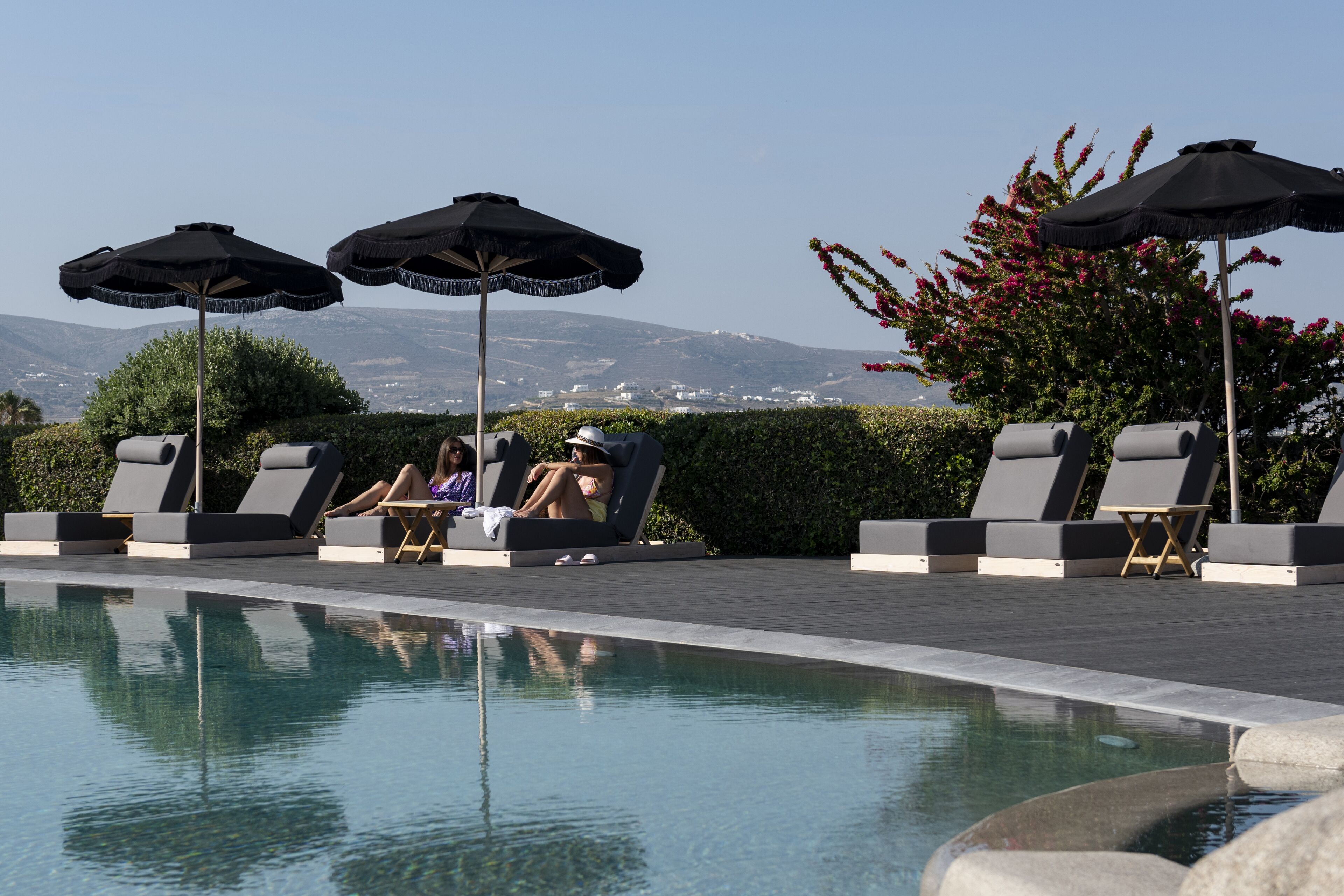 Seasonal outdoor pool, pool umbrellas, sun loungers