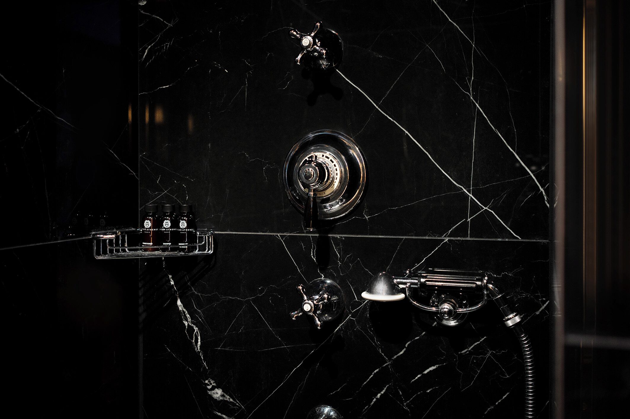 designer toiletries, hair dryer, bathrobes, slippers