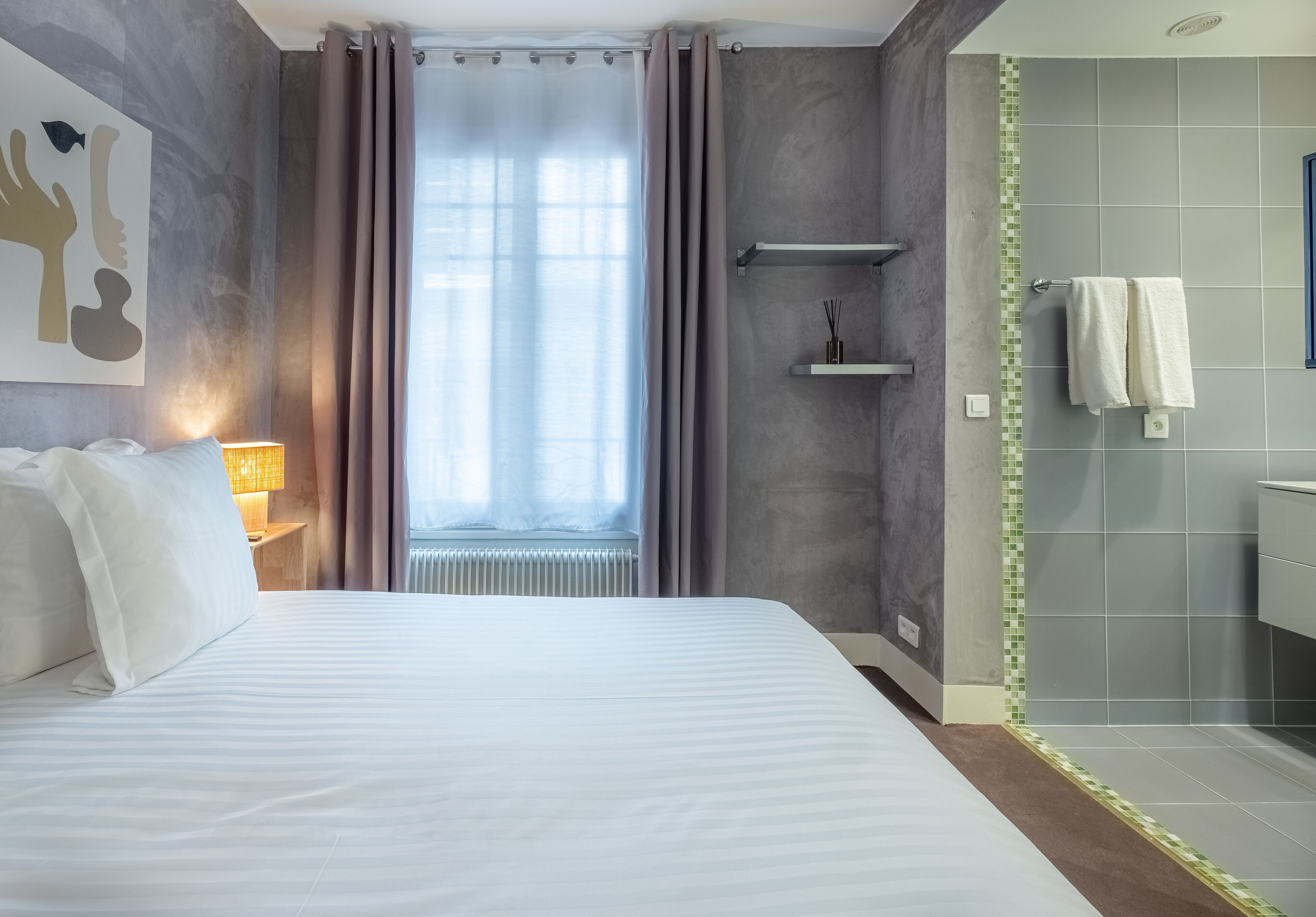 deluxe room | premium bedding, desk, laptop workspace, soundproofing