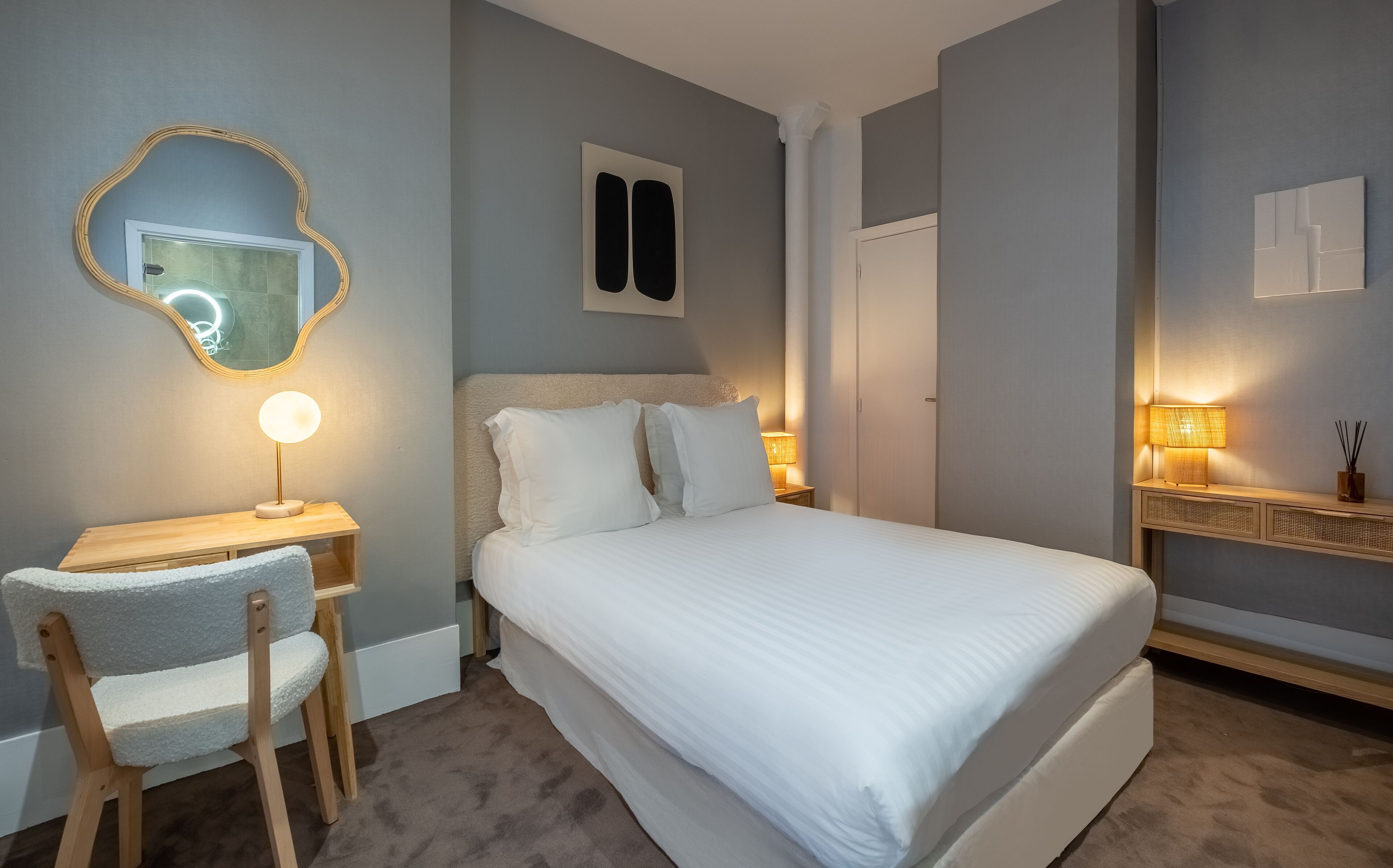 Premium bedding, desk, laptop workspace, soundproofing
