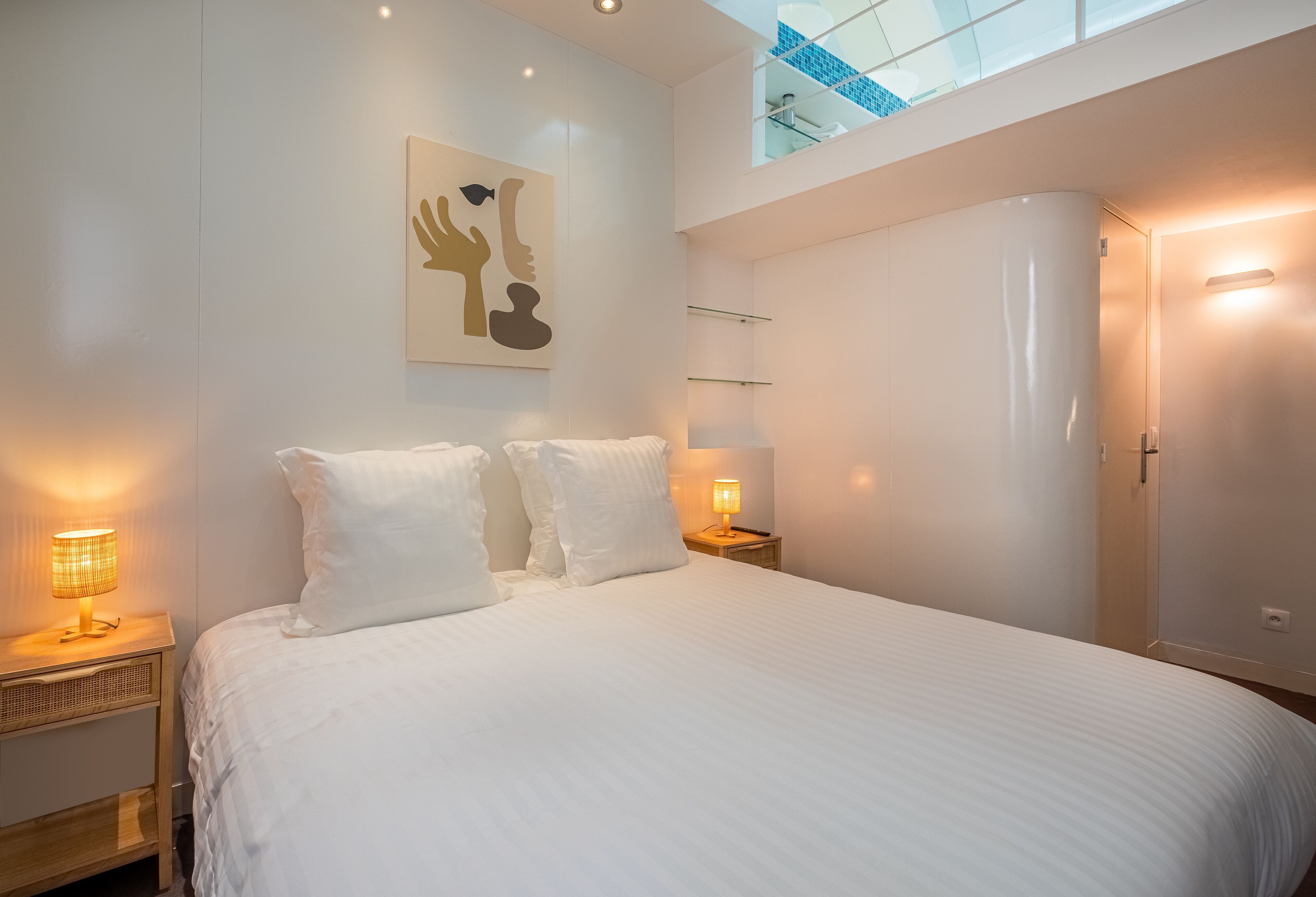 Premium bedding, desk, laptop workspace, soundproofing