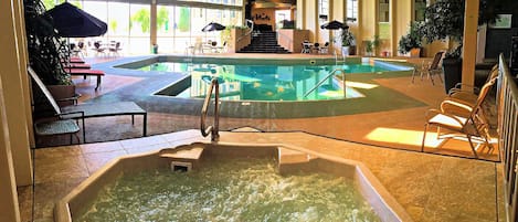 Indoor pool, pool umbrellas, pool loungers