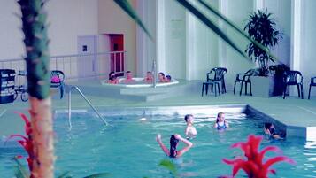 Indoor pool, pool umbrellas, sun loungers